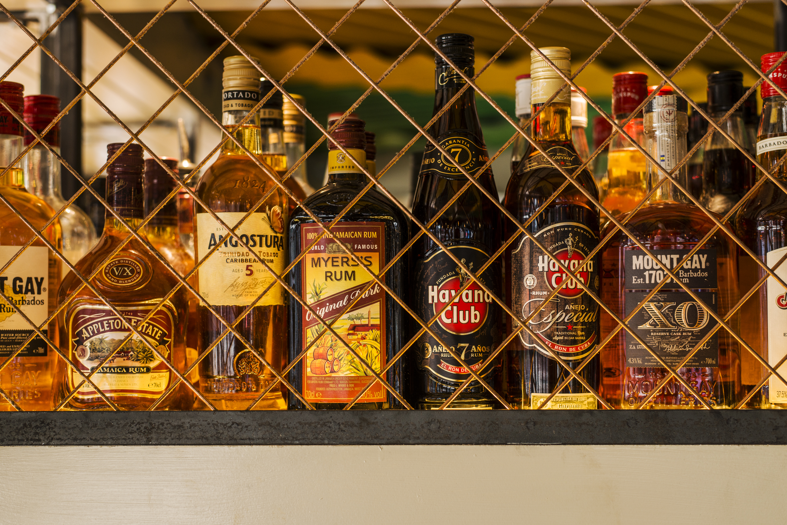 Turtle Bay rum bottles cage.jpg